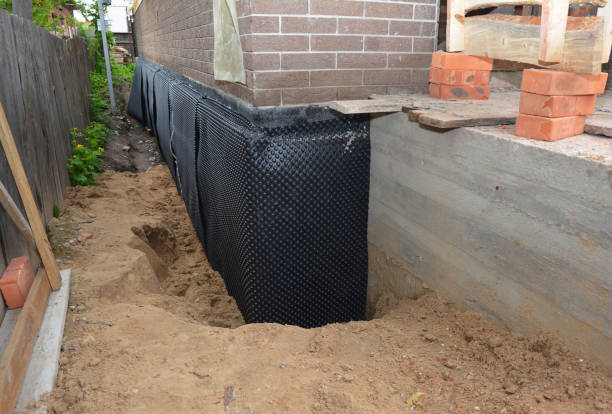 Happy homeowners after waterproofing job in Churchville
